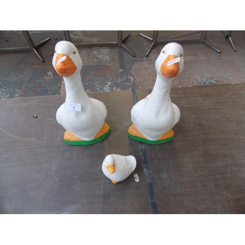 99 - THREE GOOSE CONCRETE GARDEN ORNAMENTS