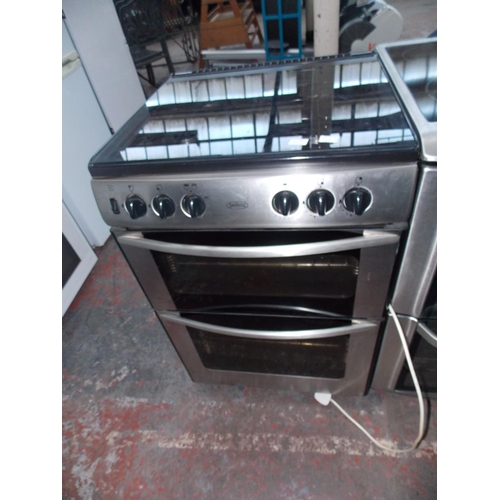 134A - A BLACK AND STAINLESS BELLING GAS COOKER WITH DOUBLE OVEN W/O
