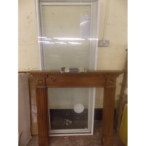 50 - TWO ITEMS - A WOODEN FIRE SURROUND AND A METAL AND A NEW GLASS SHOWER SCREEN WITH SEAL