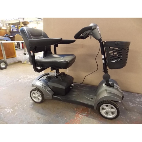 8 - A BLACK AND GREY VEA SPORT FOUR WHEELED MOBILITY SCOOTER WITH CHARGER AND KEYS IN OFFICE