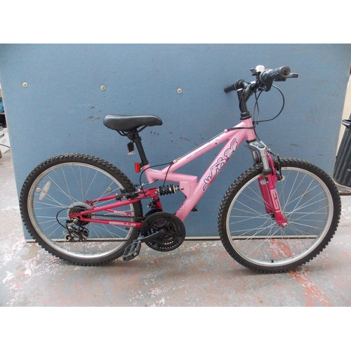 A PINK APOLLO FS 24 DUEL SUSPENSION GIRLS MOUNTAIN BIKE WITH