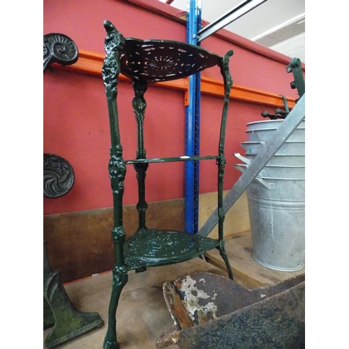 45 - TWO ITEMS TO INCLUDE A GREEN PAINTED CAST IRON PLANT STAND AND A CAST IRON SINK