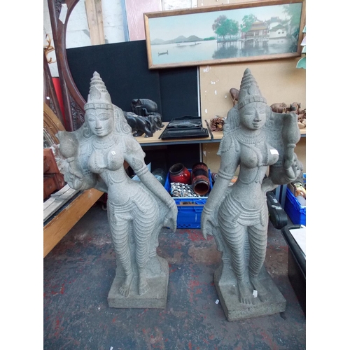 1004 - A PAIR OF LARGE HAND CARVED STATUES