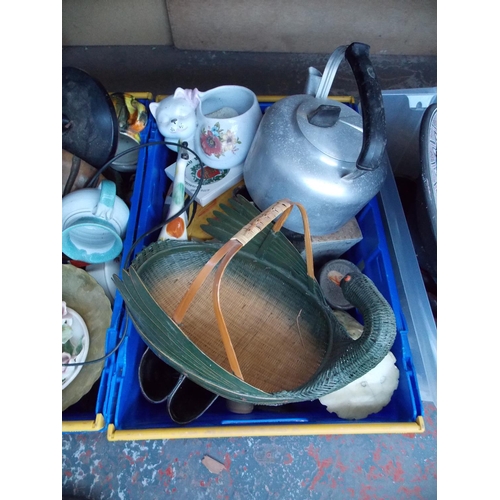 1012 - THREE BOXES CONTAINING A VINTAGE BLACK ANGLEPOISE LAMP, GLASSWARE, BASKETS, MIDDLE EASTERN CHARGER, ... 