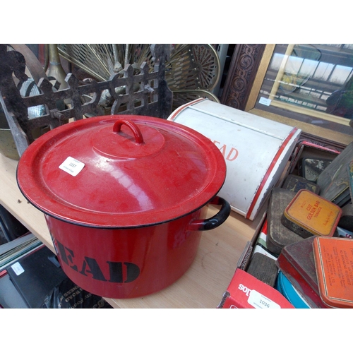 1037 - TWO ITEMS TO INCLUDE A RED AND BLACK ENAMEL POLISH BREAD BIN AND A VINTAGE RED AND WHITE METAL BREAD... 