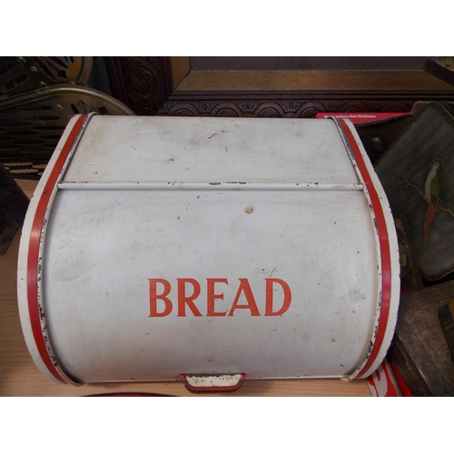 1037 - TWO ITEMS TO INCLUDE A RED AND BLACK ENAMEL POLISH BREAD BIN AND A VINTAGE RED AND WHITE METAL BREAD... 