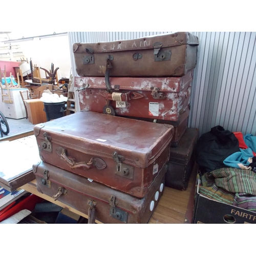 1096 - SIX VINTAGE BROWN LEATHER AND HARD SHELL SUITCASES