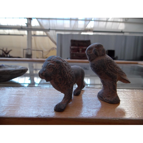 1201 - FIVE ITEMS - A ROMAN STYLE TERRACOTTA CHAMBER STICK, A REPRODUCTION BRONZED MINIATURE LION, A REPROD... 