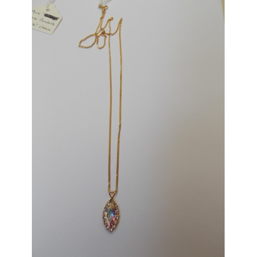 408 - A 9 CARAT GOLD CHAIN AND PENDANT STONE