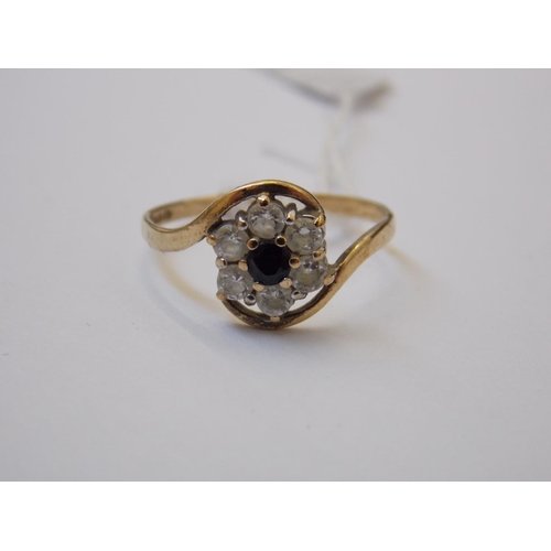 418 - A 9 CARAT GOLD SAPPHIRE CZ RING