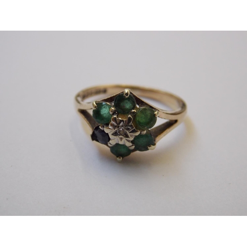 430 - A 9 CARAT GOLD AND GREEN STONE RING