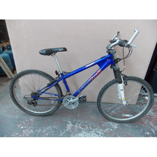 15 - A BLUE CONCEPT DROP ZONE GENTS MOUNTAIN BIKE WITH FRONT SUSPENSION AND 18 SPEED SHIMANO GEAR SYSTEM