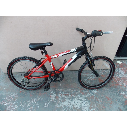 21 - A BLACK AND RED RALEIGH SHUGO BOYS MOUNTAIN BIKE WITH 5 SPEED GEAR SYSTEM