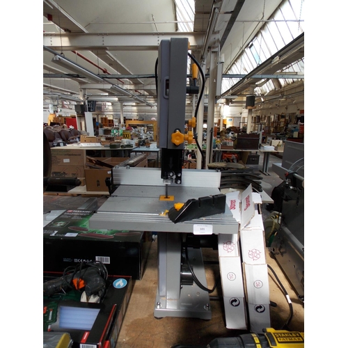 101 - A GREY TITAN TTB705BDS 350W ELECTRIC BANDSAW AND SPARE BLADES IN W/O