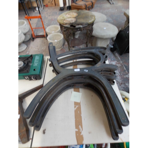 140 - TWO PAIRS OF CAST IRON BLACK PAINTED GARDEN BENCH ENDS