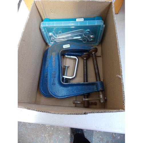 158 - A BOX CONTAINING TWO RECORD G-CLAMPS AND A SELECTION OF RING SPANNERS