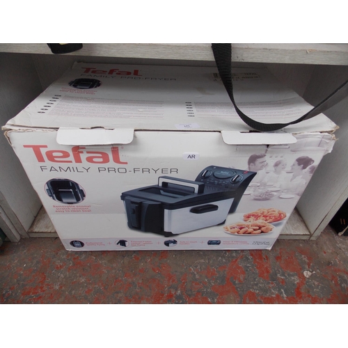 175 - A BOXED TEFAL FAMILY SIZED DEEP FAT FRYER IN W/O