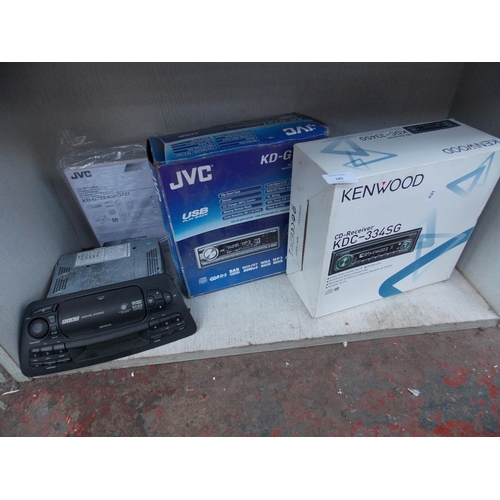 185 - THREE CAR STEREOS TO INCLUDE A BOXED KENWOOD KDC334SG, A BOXED JVC MODEL KDG721 AND A FIAT IN DASH