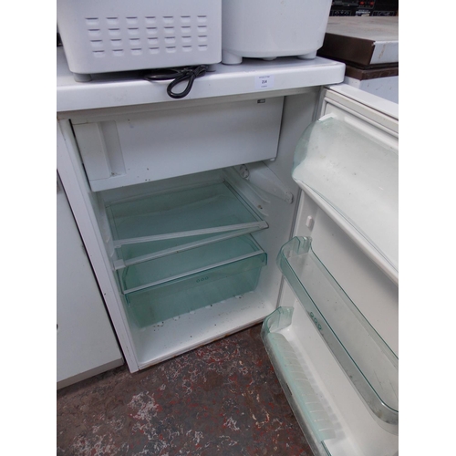 214 - A ZANUSSI ELECTROLUX UNDER COUNTER FRIDGE IN W/O