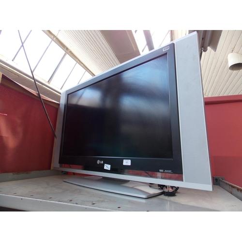 222 - A GREY LG 32 INCH FLAT SCREEN TV W/O - REMOTE IN OFFICE