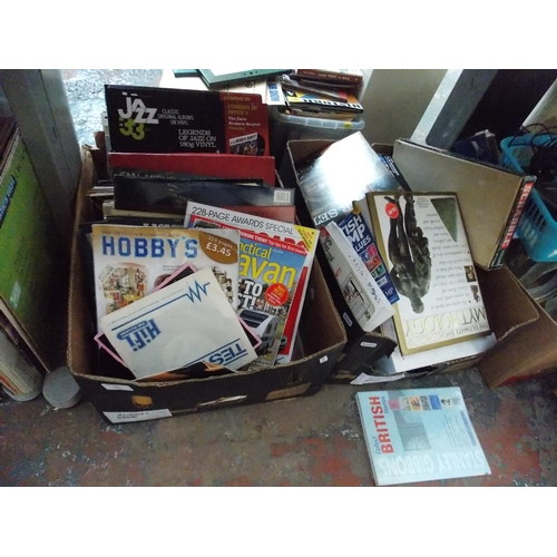 232 - SEVEN BOXES CONTAINING MIXED BOOKS, MAGAZINES, GLASSWARE, CHINA, VIDEOS ETC