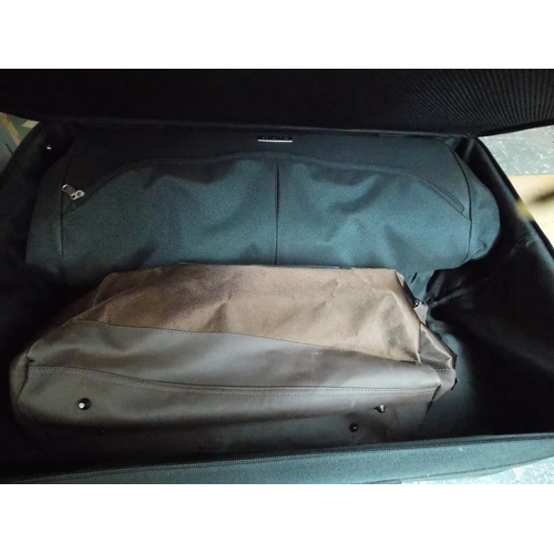 247 - A SAMSONITE SUITCASE CONTAINING A HUGO BOSS DUFFLE BAG AND A LARGE TRAVEL CASE