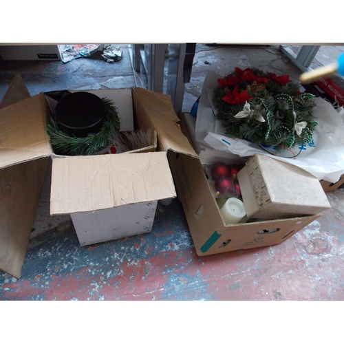 268 - FOUR BOXES CONTAINING CHRISTMAS DECORATIONS TO INCLUDE A SNOWMAN LIGHT, CANDLES ETC