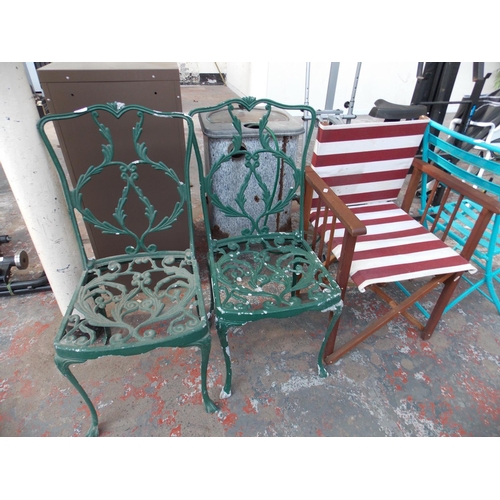 27 - THREE ITEMS TO INCLUDE TWO CAST ALUMINUM ORNATE GARDEN CHAIRS AND A TEAK DIRECTORS CHAIR