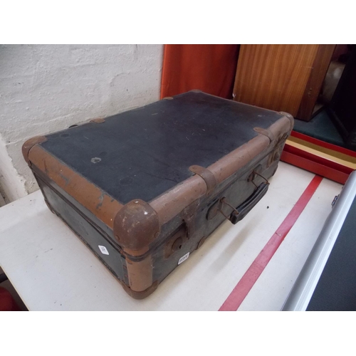 272 - A VINTAGE SUITCASE, A DARTBOARD AND A BOXED MEASURING INSTRUMENT