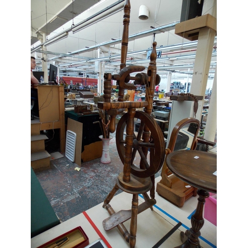 273 - A VINTAGE OAK SPINNING WHEEL