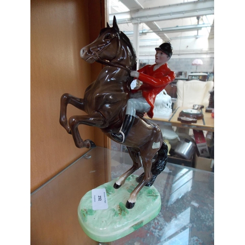 292 - A BESWICK HUNTSMAN ON REARING HORSE