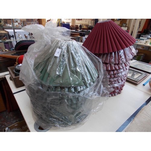 328 - TWENTY ONE BURGUNDY LAMP SHADES