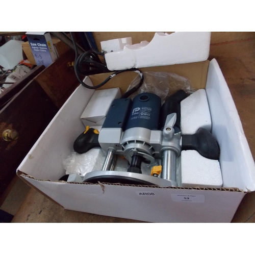 53 - A BOXED AS NEW PERFORMANCE POWER MODEL CLM1250R ELECTRIC ROUTER AND ATTACHMENTS IN W/O