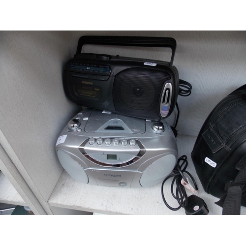 174 - TWO ITEMS TO INCLUDE A HITACHI PORTABLE CD RADIO TAPE AND A HITACHI RADIO CASSETTE W/O