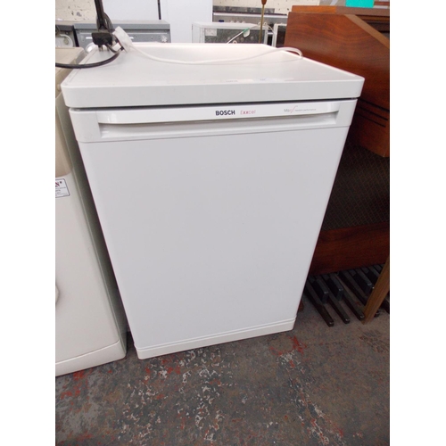 229 - A BOSCH EXXCEL UNDER COUNTER FREEZER IN W/O