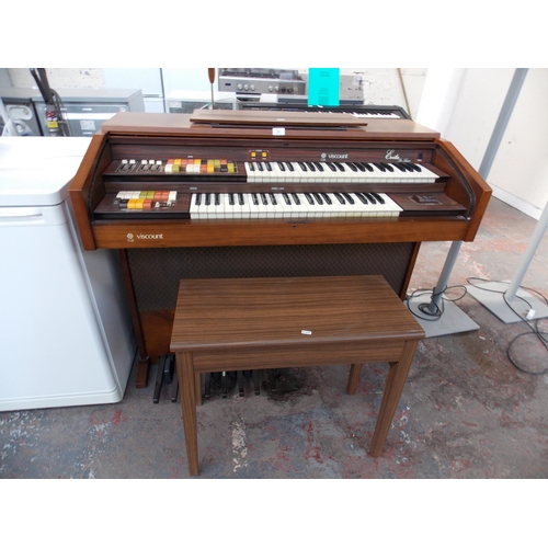 230 - A VINTAGE VISCOUNT MODEL EVITA DELUXE ELECTRIC ORGAN AND STOOL IN W/O