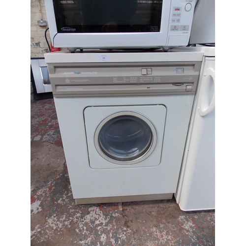 215 - A HOOVER LOGIC REVERSING TUMBLE DRYER IN W/O