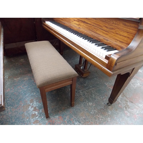 438 - A ROGERS OF LONDON MAHOGANY BABY GRAND PIANO WITH STOOL