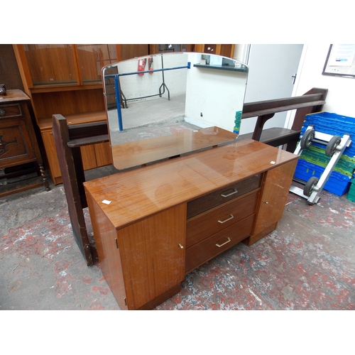 536 - AN AUSTINSUITE RETRO TEAK HIGH GLOSS DRESSING TABLE WITH THREE DRAWERS AND TWO DOORS