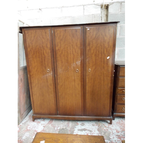 540 - A STAG MAHOGANY TRIPLE WARDROBE