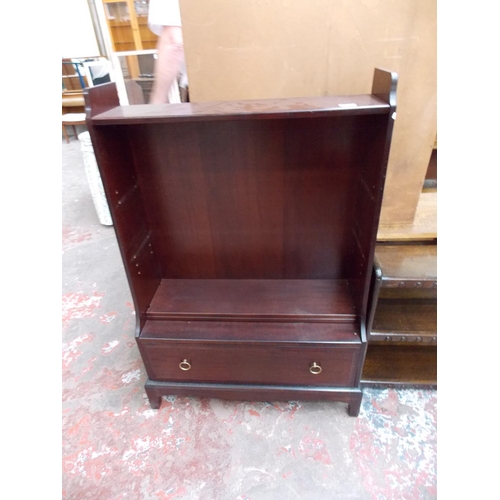 557 - A STAG MAHOGANY BOOKCASE WITH ONE DRAWER