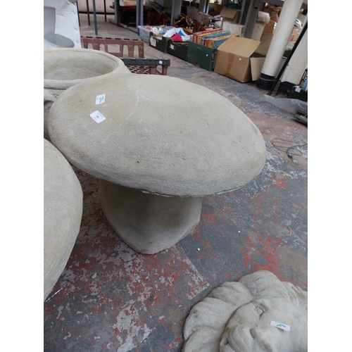 151 - A LARGE RECONSTITUTED STONE TOADSTOOL GARDEN ORNAMENT