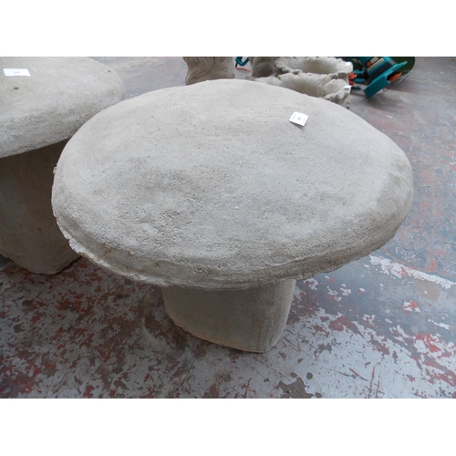 152 - A LARGE RECONSTITUTED STONE TOADSTOOL GARDEN ORNAMENT