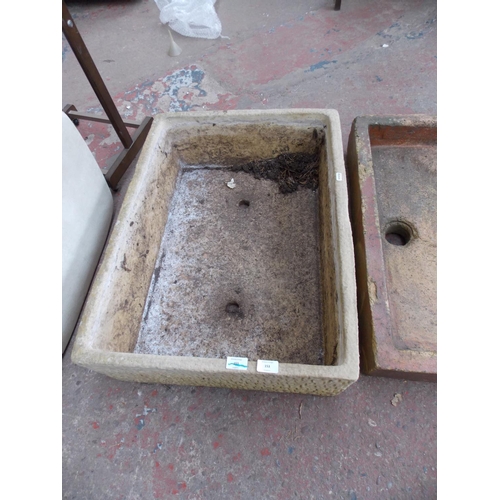 160 - A LARGE RECTANGULAR TEXTURED CONCRETE GARDEN PLANTER