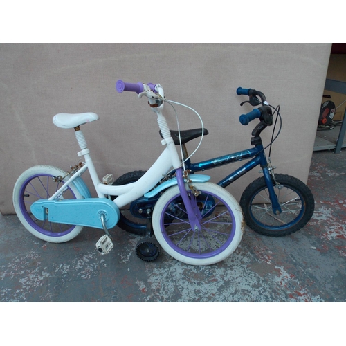 18 - TWO BIKES TO INCLUDE A BLUE STAR WARS BOYS BMX AND A PURPLE AND WHITE SMALL GIRLS BIKE