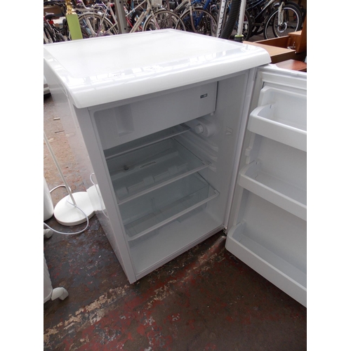 194 - A BEKO UNDER COUNTER FRIDGE IN W/O