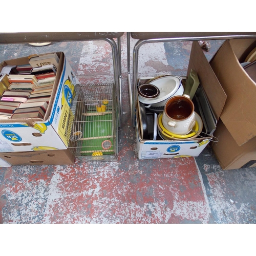 223 - SIX BOXES CONTAINING BOOKS, KITCHENALIA, RUGS, BIRD CAGE ETC