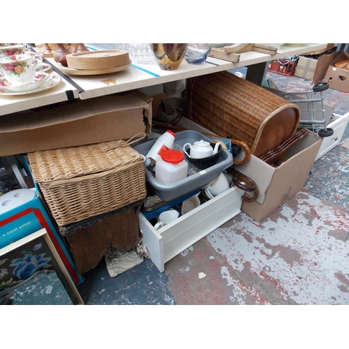 248A - A LARGE QUANTITY OF ITEMS TO INCLUDE WICKER BASKETS, KITCHENALIA, GLASSWARE, LIGHTS, WALKING CANES E... 