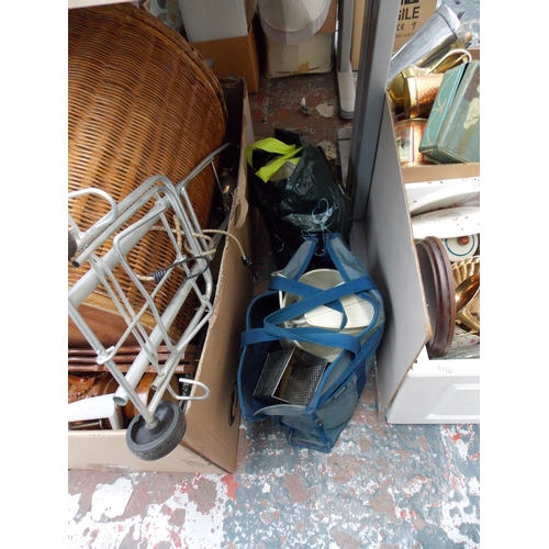 248A - A LARGE QUANTITY OF ITEMS TO INCLUDE WICKER BASKETS, KITCHENALIA, GLASSWARE, LIGHTS, WALKING CANES E... 