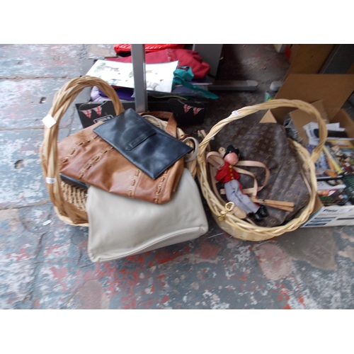 261 - TWO BASKETS CONTAINING LADIES HANDBAGS AND A PUPPET